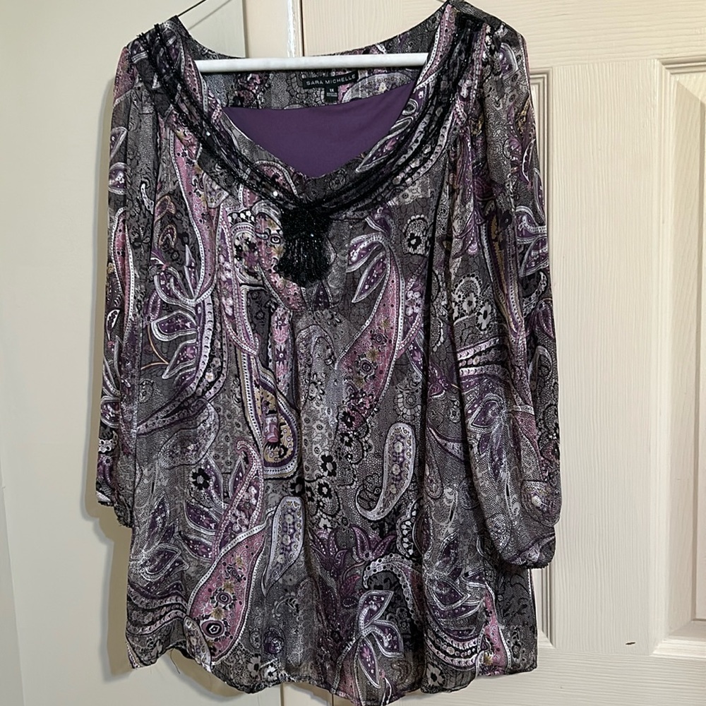 Paisley top with decorative accent